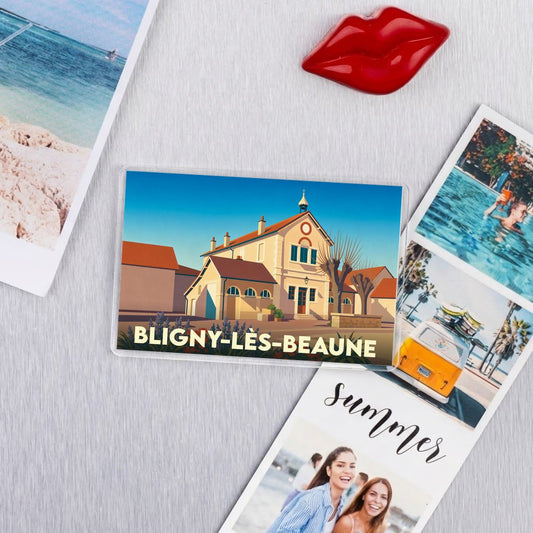 Magnet souvenir de la ville de Bligny-lès-Beaune avec une illustration stylisée.