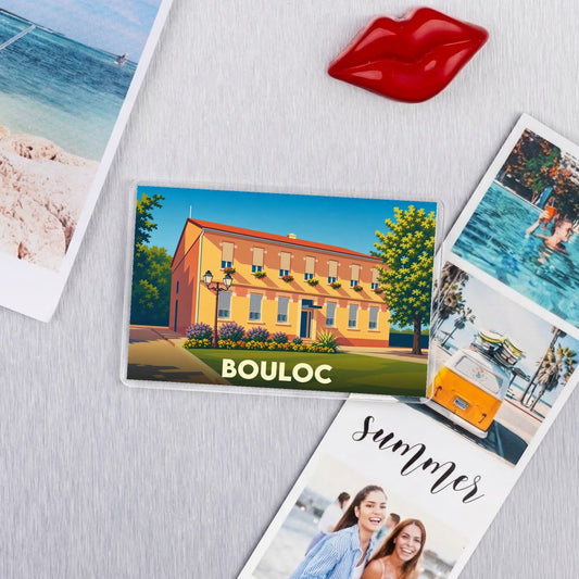 Magnet souvenir de la ville de Bouloc avec une illustration stylisée.