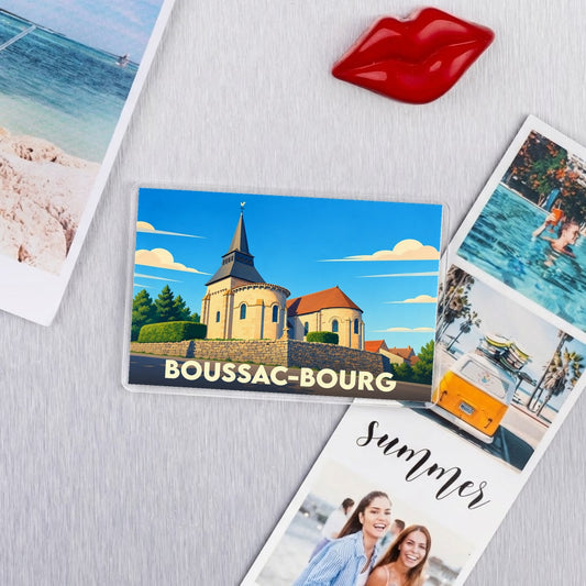 Magnet souvenir de la ville de Boussac-Bourg avec une illustration stylisée de son église.