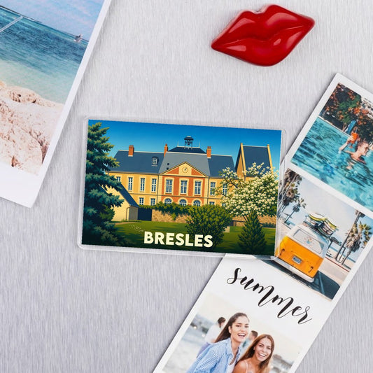 Magnet souvenir de la ville de Bresles avec une illustration stylisée de son château.