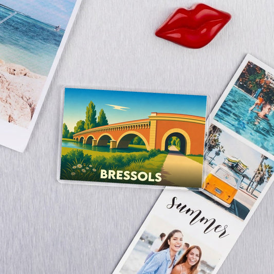 Magnet souvenir de la ville de Bressols avec une illustration stylisée de son pont.