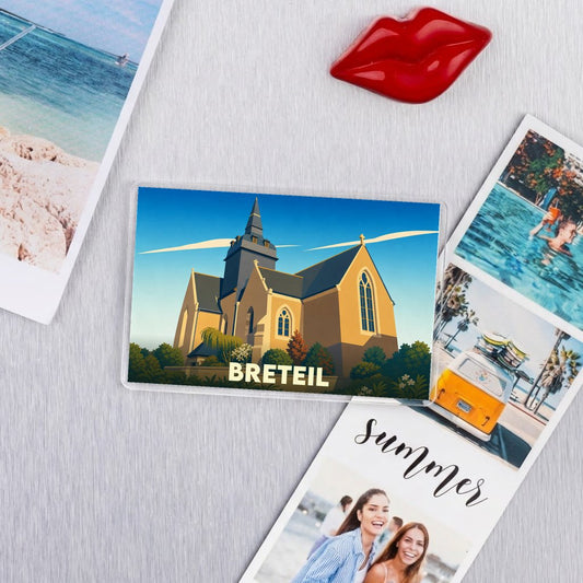 Magnet souvenir de la ville de Breteil avec une illustration stylisée de son église.
