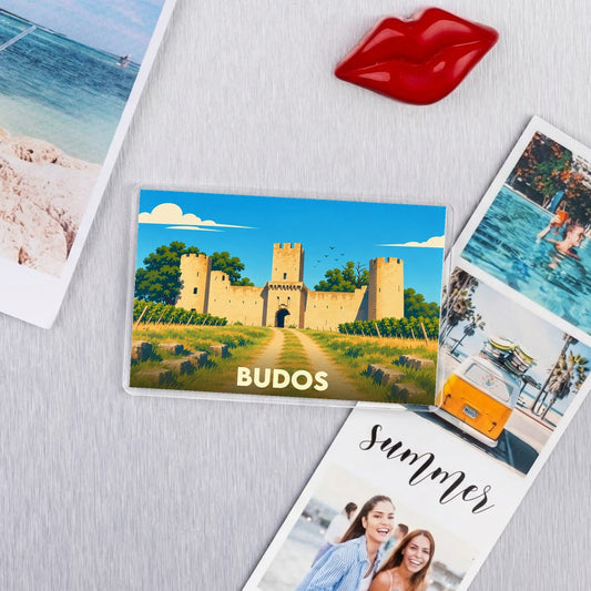Magnet souvenir de la ville de Budos avec une illustration stylisée de son château.