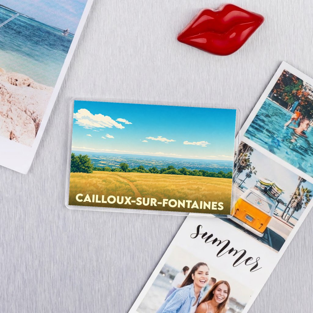 Magnet souvenir de la ville de Cailloux-sur-Fontaines avec une illustration de paysage champêtre.