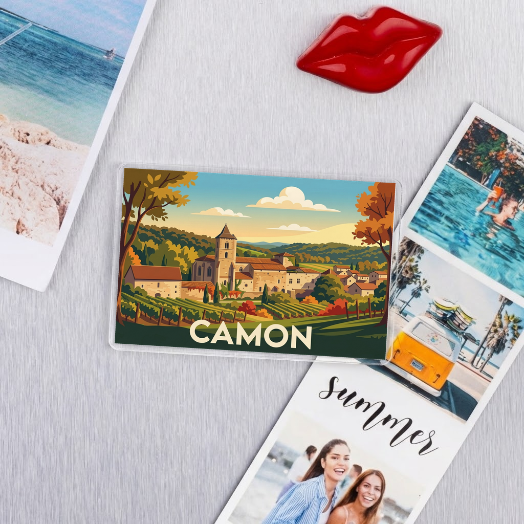 Magnet souvenir de la ville de Camon avec une illustration stylisée.
