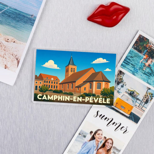 Magnet souvenir de la ville de Camphin-en-Pévèle avec une illustration stylisée de son église.