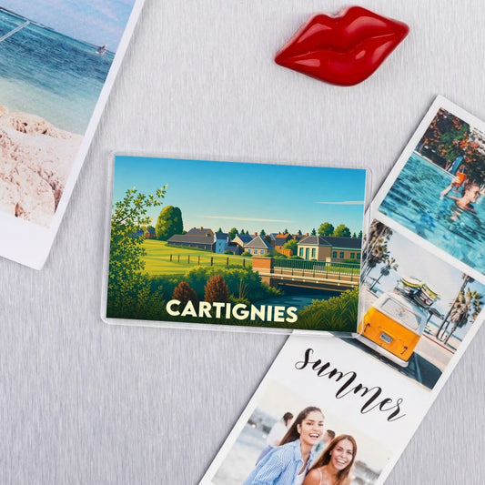 Magnet souvenir de la ville de Cartignies avec une illustration paysagère stylisée.