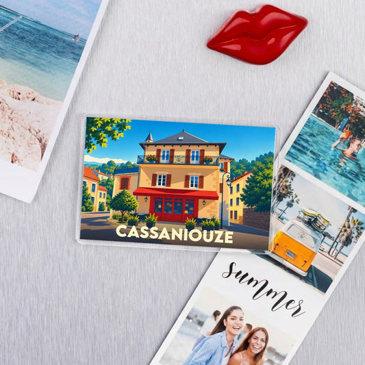 Magnet souvenir de la ville de Cassaniouze avec une illustration stylisée.