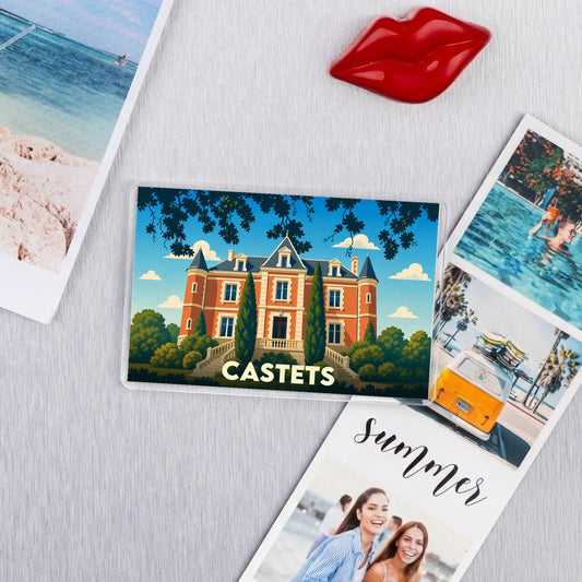Magnet souvenir de la ville de Castets avec une illustration stylisée d'un château.