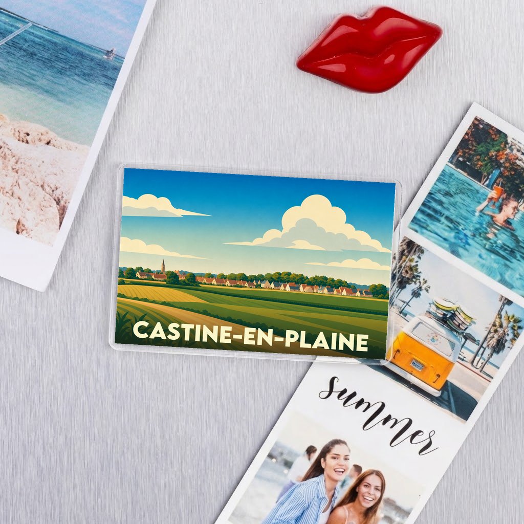 Magnet souvenir de la ville de Castine-en-Plaine avec une illustration de paysage champêtre.