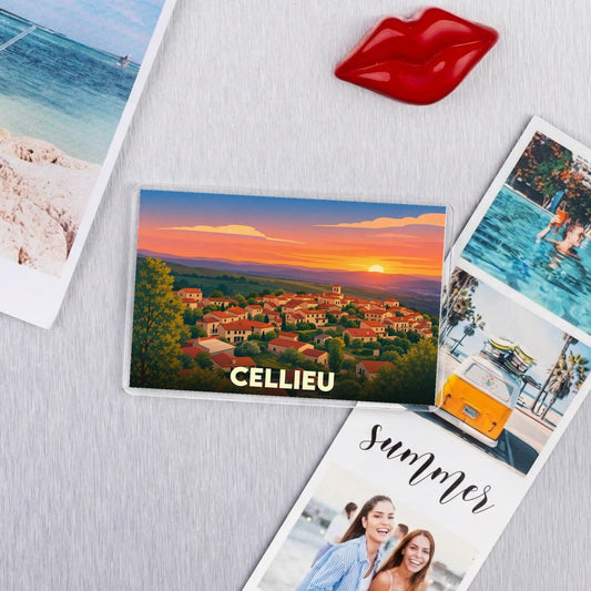 Magnet souvenir de la ville de Cellieu avec une illustration stylisée d'un coucher de soleil sur le village.
