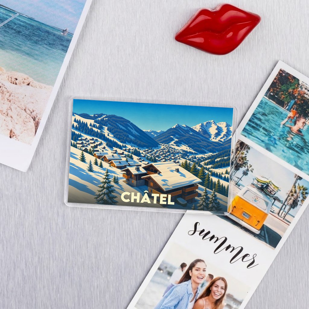 Magnet souvenir de la ville de Châtel illustrant une vue enneigée de la station.