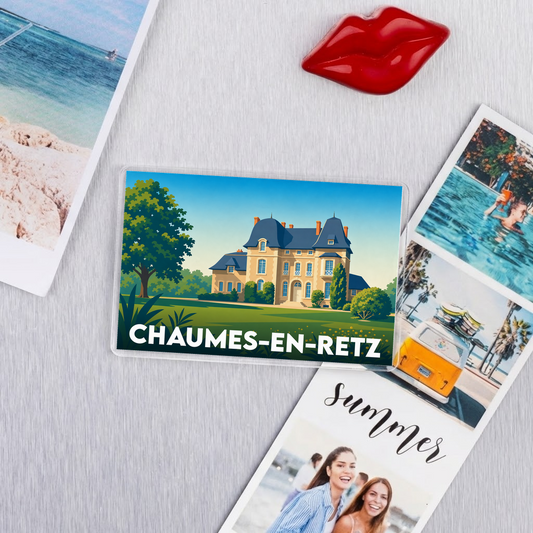 Magnet souvenir de la ville de Chaumes-en-Retz avec une illustration stylisée d'un manoir.