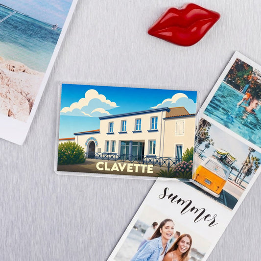 Magnet souvenir de la ville de Clavette avec une illustration stylisée d'un bâtiment typique.