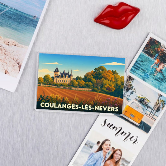 Magnet souvenir de la ville de Coulanges-lès-Nevers avec une illustration stylisée d'un château entouré d'arbres.