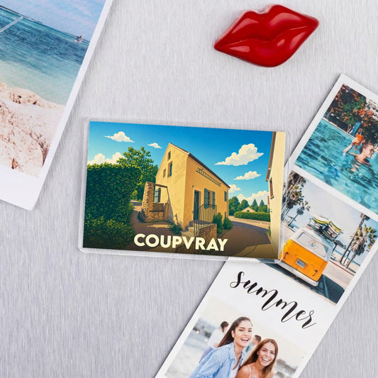 Magnet souvenir de la ville de Coupvray avec une illustration stylisée de la maison natale de Louis Braille.