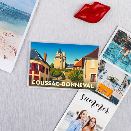 Magnet souvenir de la ville de Coussac-Bonneval avec une illustration stylisée de son château.