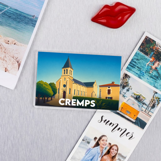 Magnet souvenir de la ville de Cremps avec une illustration stylisée de son église.