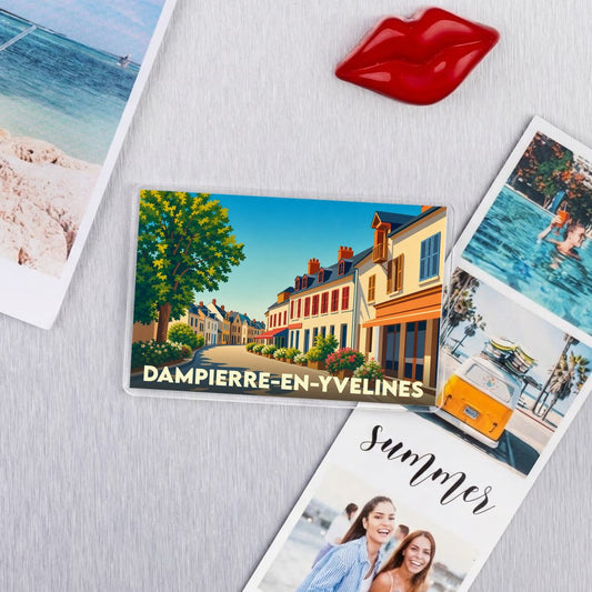 Magnet souvenir de la ville de Dampierre-en-Yvelines avec une illustration colorée et stylisée.