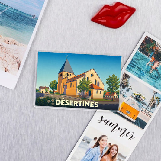 Magnet souvenir de la ville de Désertines avec une illustration stylisée de son église.
