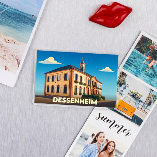 Magnet souvenir de la ville de Dessenheim avec une illustration stylisée.