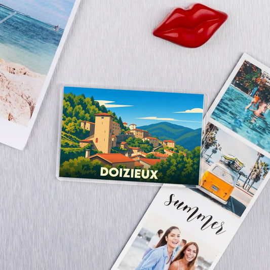 Magnet souvenir de la ville de Doizieux avec une illustration stylisée.