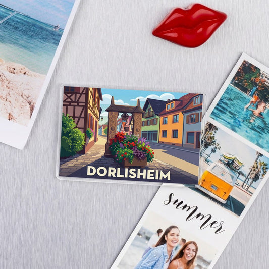 Magnet souvenir de la ville de Dorlisheim avec une illustration stylisée.