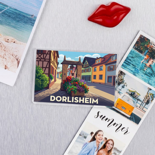 Magnet souvenir de la ville de Dorlisheim avec une illustration stylisée.