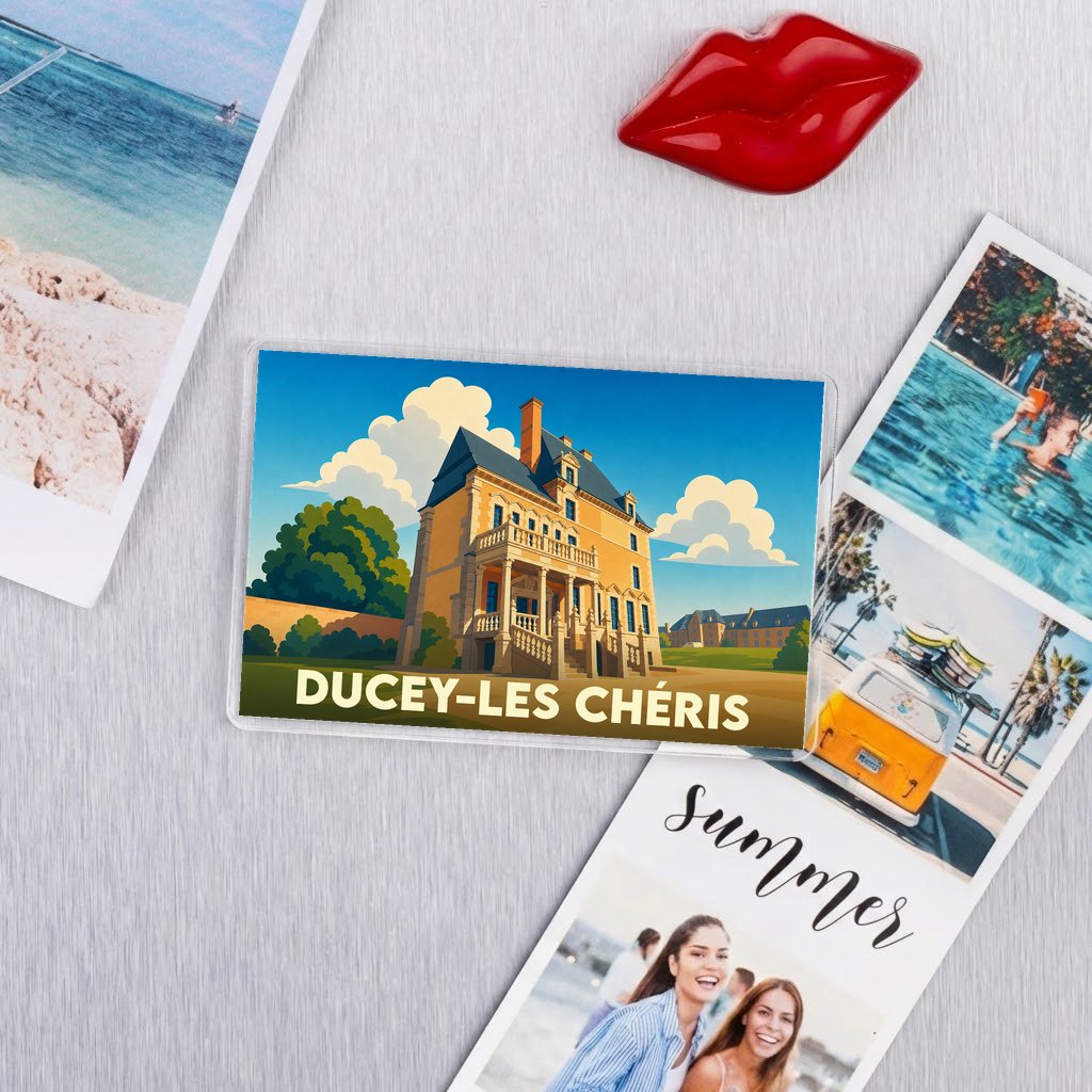 Magnet souvenir de la ville de Ducey-Les Chéris avec une illustration stylisée d'un château.