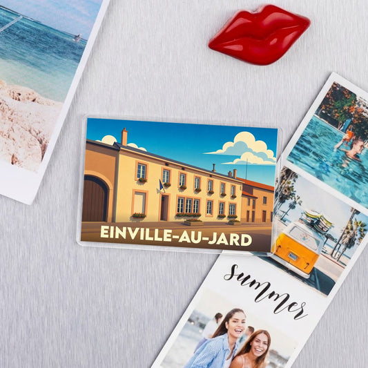 Magnet souvenir de la ville de Einville-au-Jard avec une illustration stylisée.