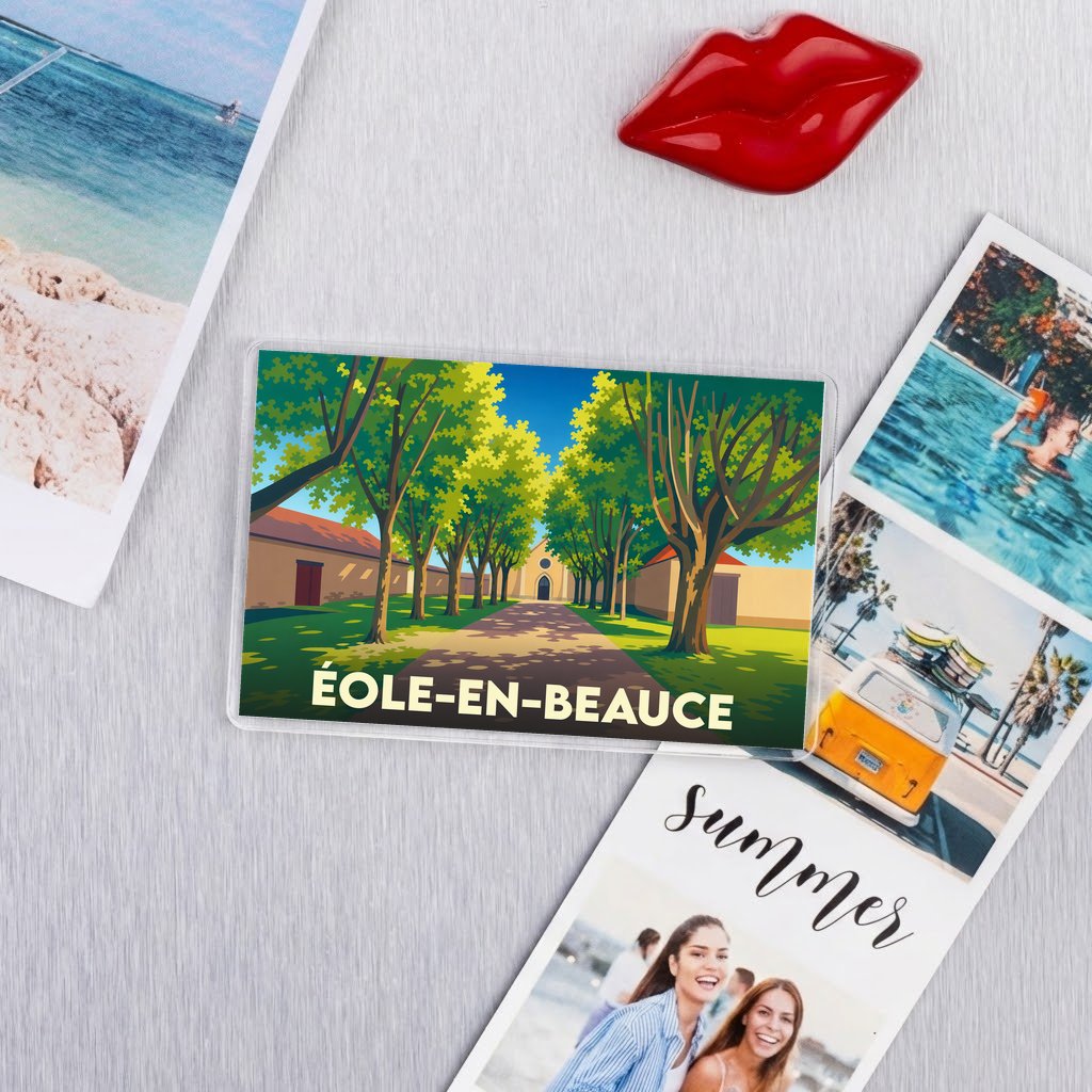 Magnet souvenir de la ville de Éole-en-Beauce avec une illustration stylisée d'une allée d'arbres.
