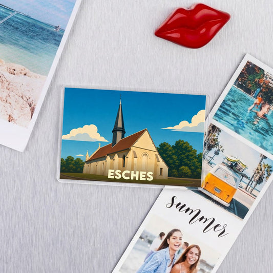 Magnet souvenir de la ville de Esches avec une illustration stylisée d'une église.