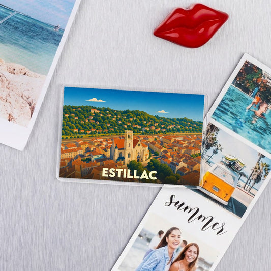 Magnet souvenir de la ville d'Estillac avec une illustration stylisée de son paysage urbain.