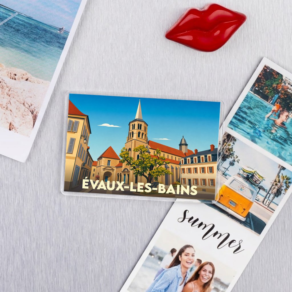 Magnet souvenir de la ville de Évaux-les-Bains avec une illustration stylisée d'une église et de bâtiments locaux.