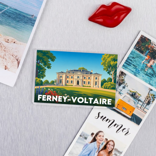 Magnet souvenir de la ville de Ferney-Voltaire avec une illustration stylisée.