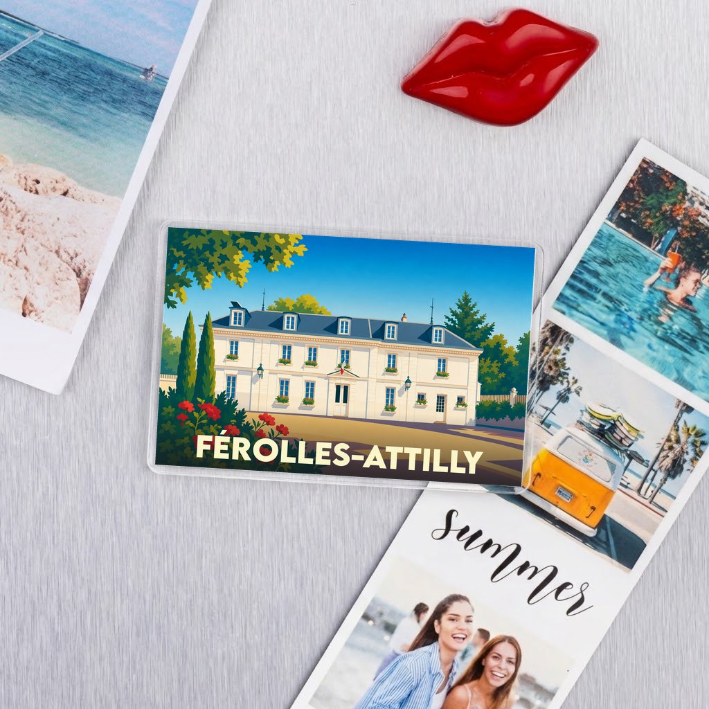 Magnet souvenir de la ville de Férolles-Attilly avec une illustration stylisée d'une bâtisse classique.