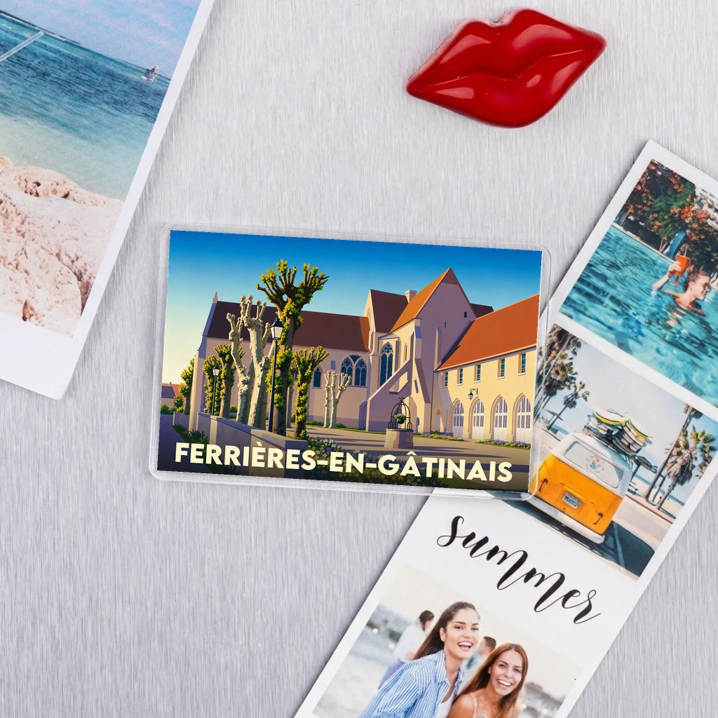 Magnet souvenir de la ville de Ferrières-en-Gâtinais avec une illustration stylisée de son abbaye.