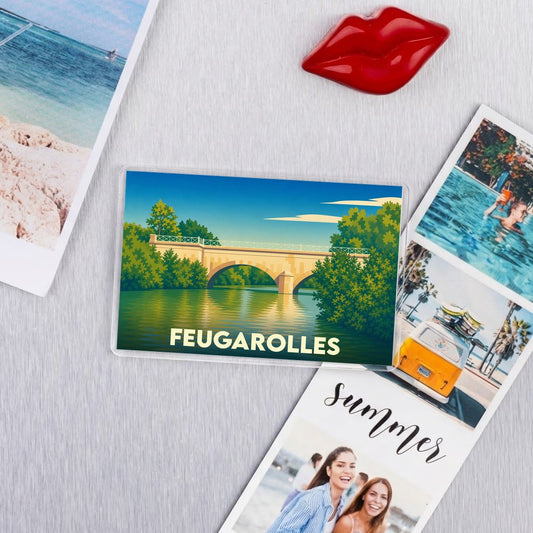 Magnet souvenir de la ville de Feugarolles avec une illustration stylisée de son pont.