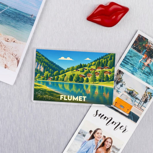 Magnet souvenir de la ville de Flumet avec une illustration de paysage de montagne et de lac.