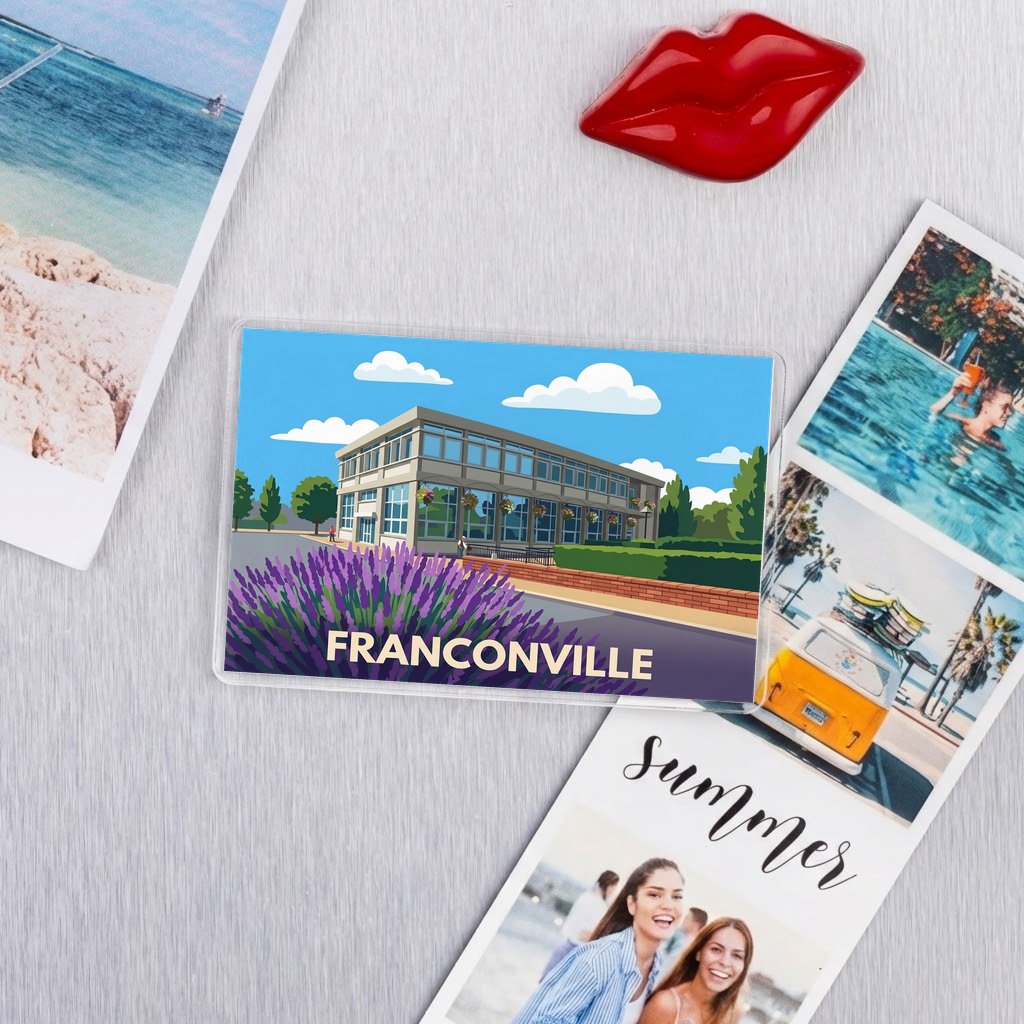 Magnet souvenir de la ville de Franconville avec une illustration stylisée.