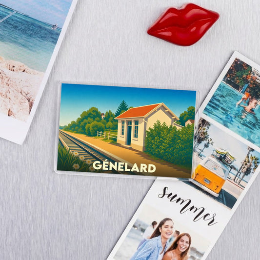 Magnet souvenir de la ville de Génelard avec une illustration stylisée d'une gare ferroviaire.