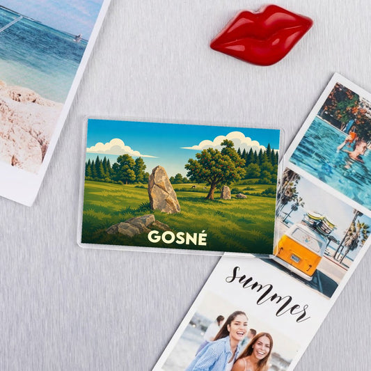Magnet souvenir de la ville de Gosné avec une illustration stylisée d'un paysage champêtre.