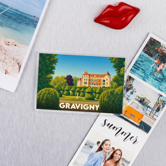 Magnet souvenir de la ville de Gravigny avec une illustration stylisée d'un château et de ses jardins.