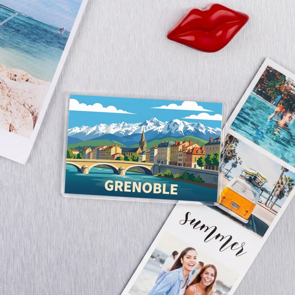 Magnet souvenir de la ville de Grenoble avec une illustration stylisée.