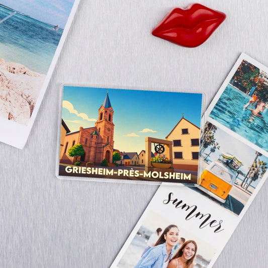Magnet souvenir de la ville de Griesheim-près-Molsheim avec une illustration stylisée.