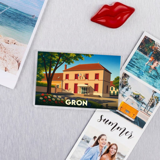 Magnet souvenir de la ville de Gron avec une illustration stylisée de sa mairie.
