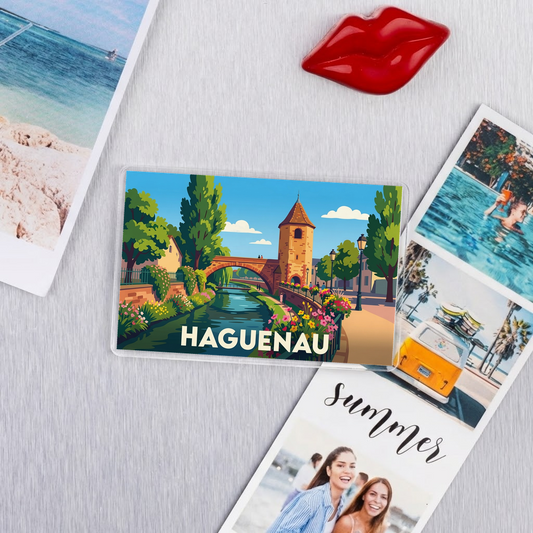 Magnet souvenir de la ville de Haguenau avec une illustration stylisée.