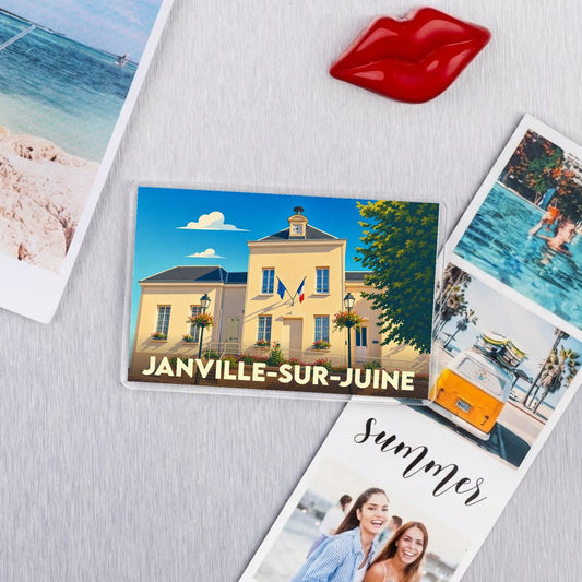 Magnet souvenir de la ville de Janville-sur-Juine avec une illustration stylisée de la mairie.