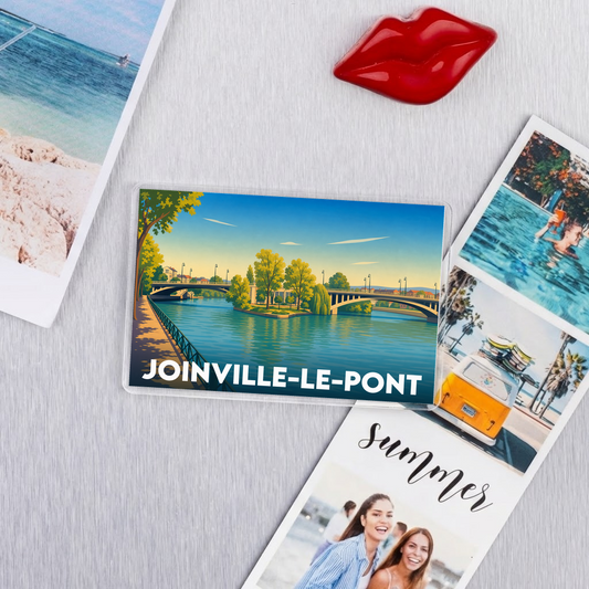 Magnet souvenir de la ville de Joinville-le-Pont avec une illustration stylisée d'un pont enjambant la rivière.