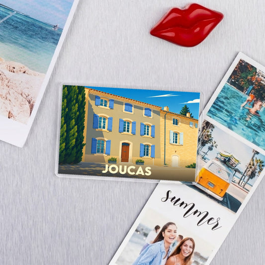 Magnet souvenir de la ville de Joucas avec une illustration stylisée.